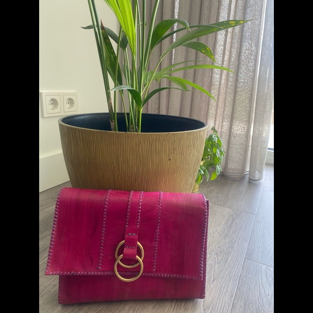 Handmade pink leather clutch