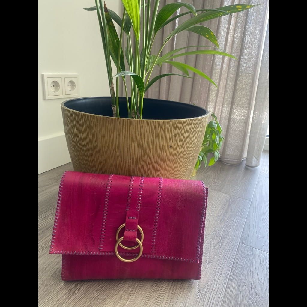 Handmade pink leather clutch