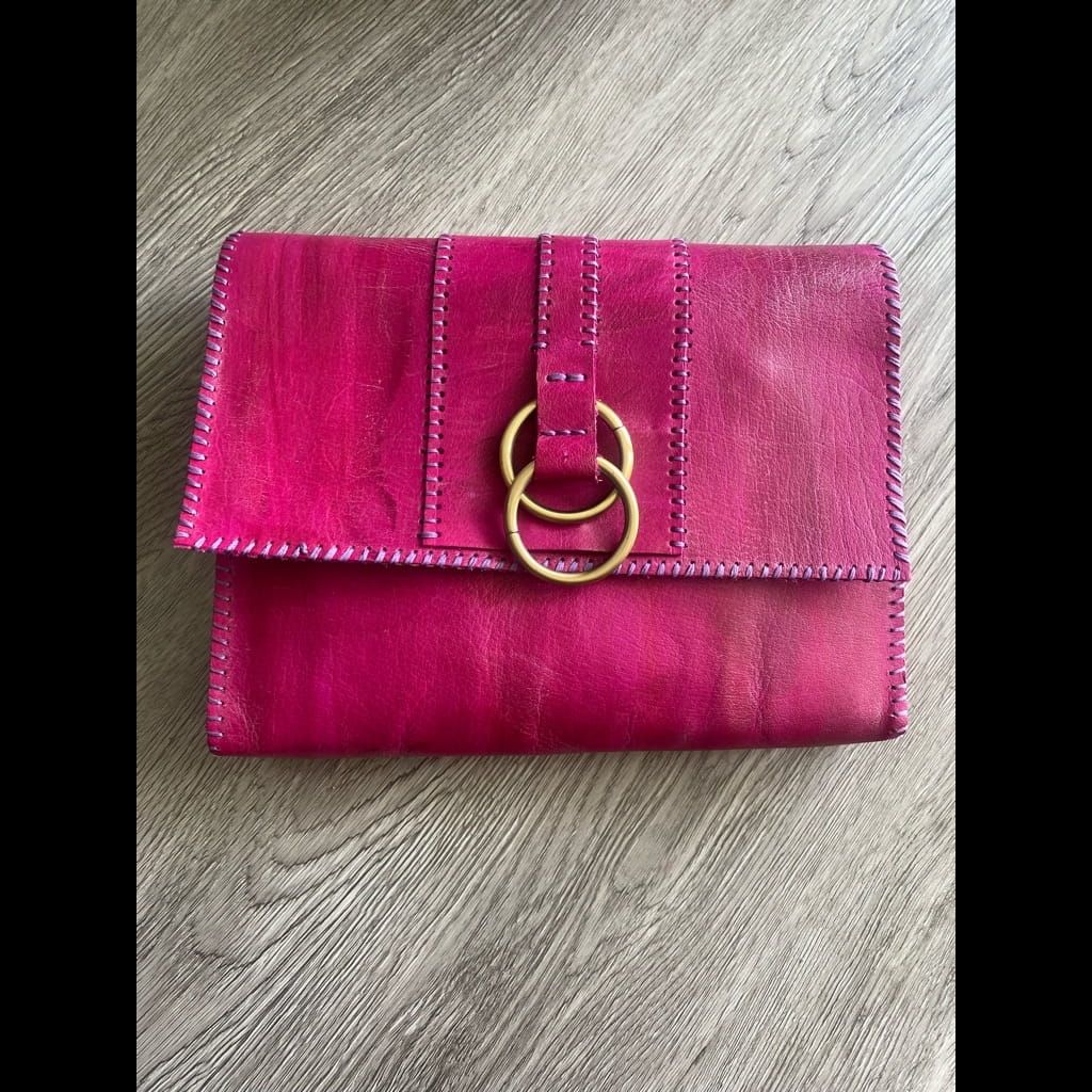 Handmade pink leather clutch