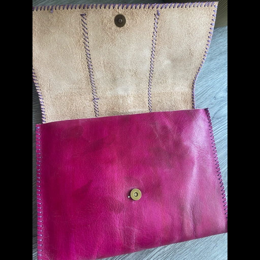 Handmade pink leather clutch