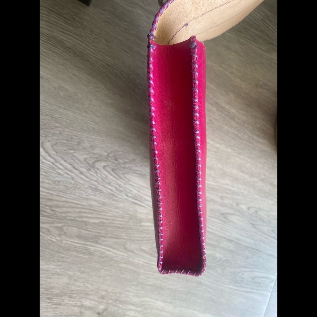 Handmade pink leather clutch