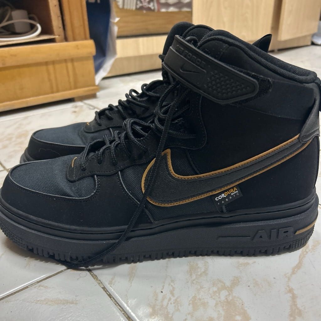 Nike shoes black and gold