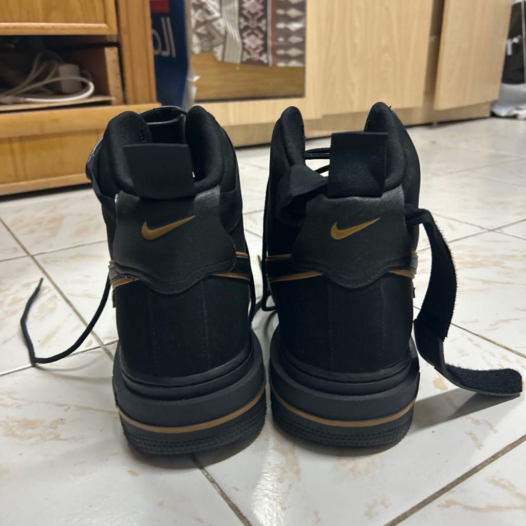 Nike shoes black and gold