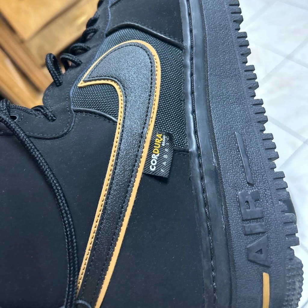 Nike shoes black and gold