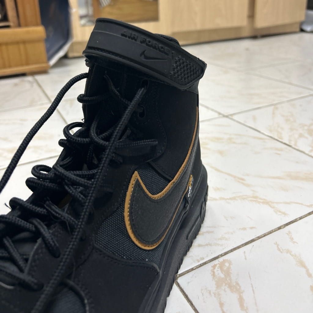 Nike shoes black and gold