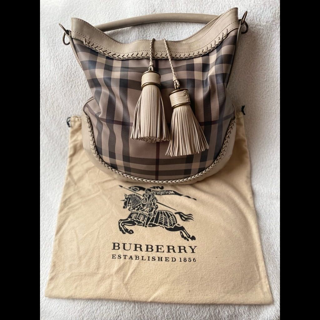 A very good condition Burberry bag with dust bag