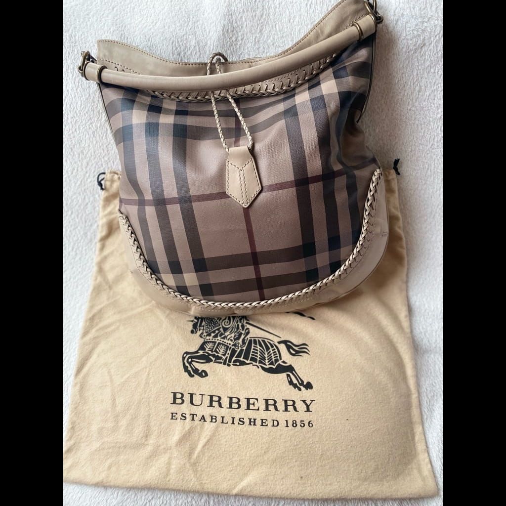 A very good condition Burberry bag with dust bag